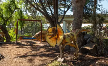 Dinosaur themed children's playground at Geelong Holiday Park near the Barwon River.