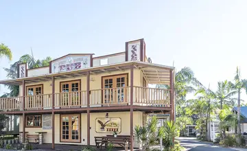 Unique Old Town Pub accommodation at Wairo Beach Holiday Park near Wairo Beach.